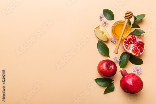 Flat lay composition with symbols jewish Rosh Hashanah holiday attributes on colored background, Rosh hashanah concept. New Year holiday Traditional. Top view with copy space