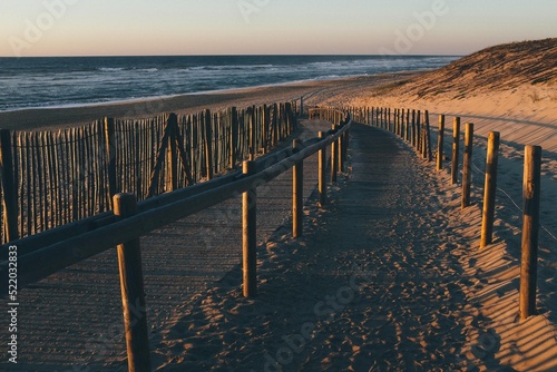 Path to the beach of the atlantic ocean in france with beautiful light and sunset © Andreas