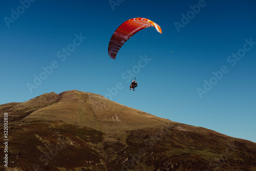 paragliding in the mountains of the pyrenees in south france