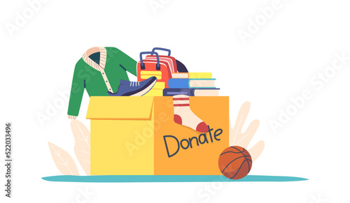 Cloth Donation and Charity Concept. Carton Box Full of Different Clothes, Stationery, School Stuff and Books for Poor