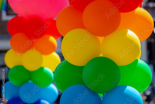Colour of gay pride, Decoration with colourful rainbow balloons on the boat and along street, Amsterdam canal parade, LGBT annual festival to celebration, The greatest events in the world, Netherlands