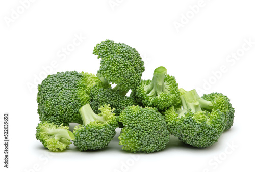 pieces of broccoli on a white isolated background