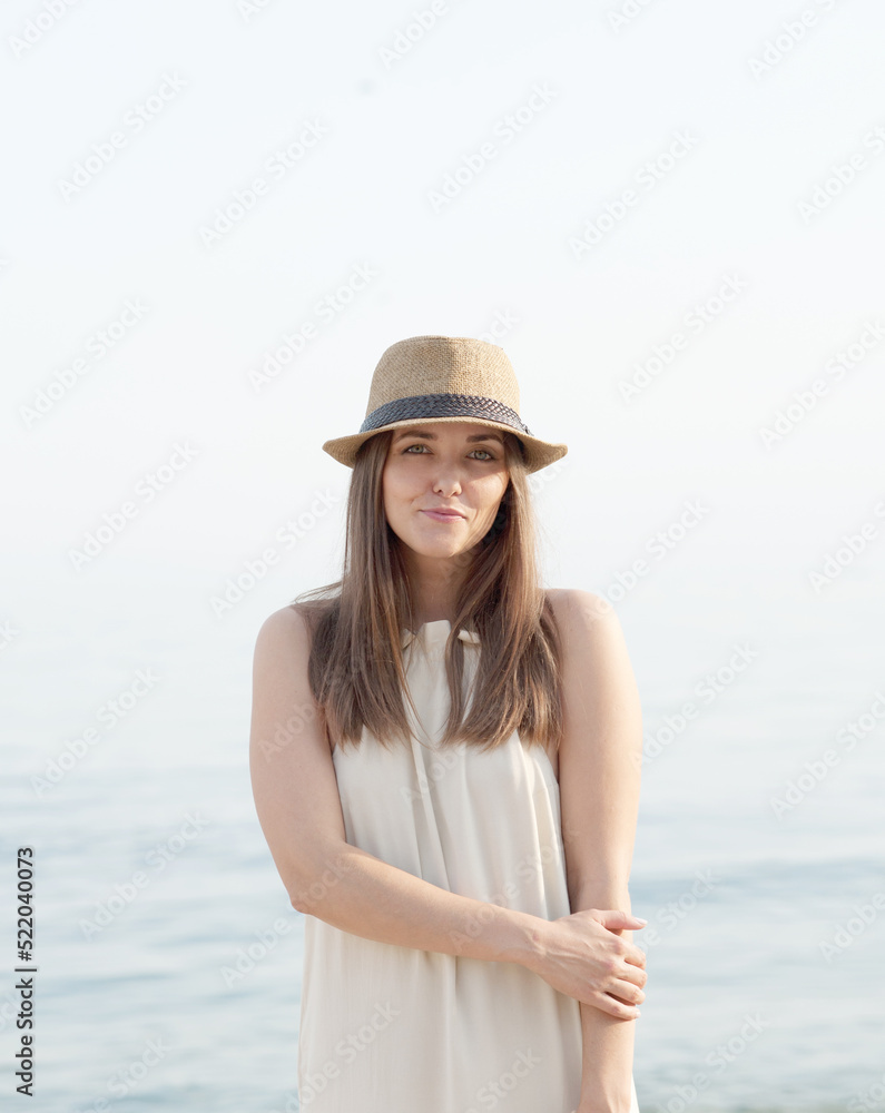 Cute youg calm woman portrait near sea