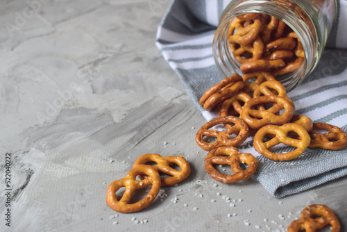 Photos delicious bagels with salt for a snack to alcohol fell out of the jar