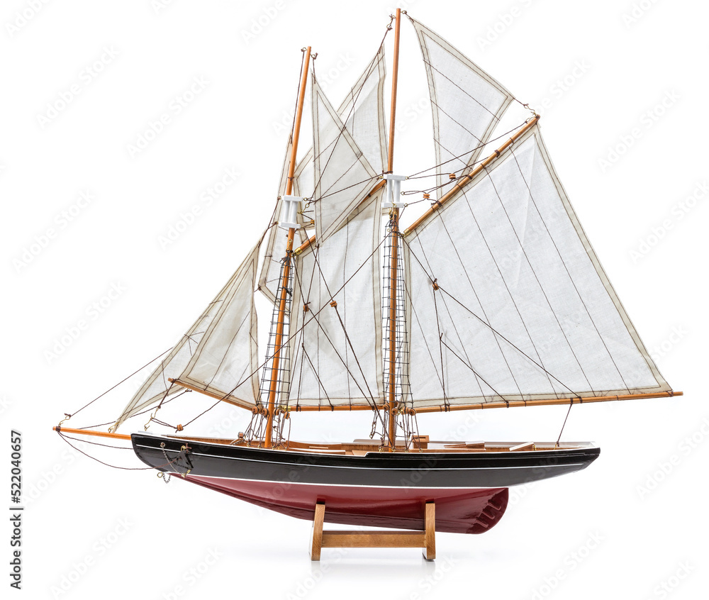 Naklejka premium Model of wooden sailing ship on white background