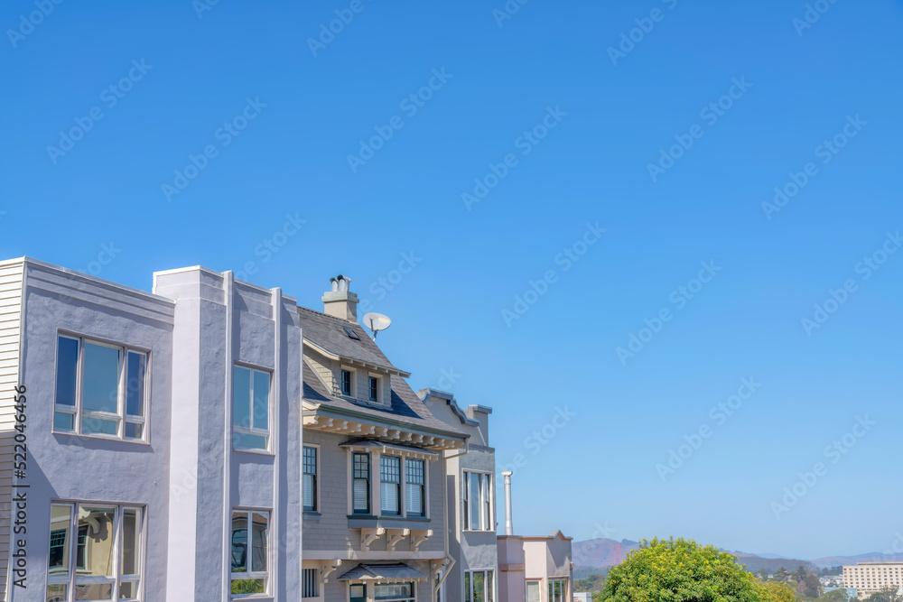 Side view of houses with modern and traditional designs and a view of mountain at San Francisco, CA
