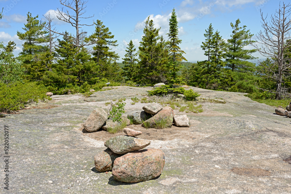 Obraz premium Acadia National Park in State of Maine. Cadillac North Ridge Trail in summer. Bates cairns