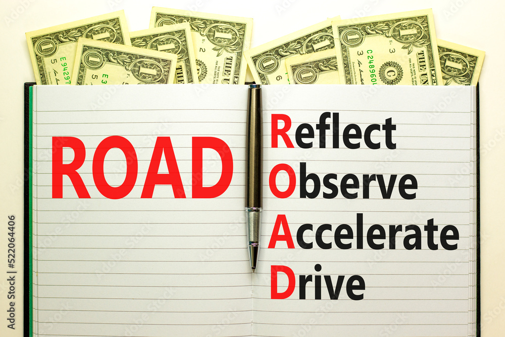ROAD reflect observe accelerate drive symbol. Concept words ROAD reflect observe accelerate drive on white note, dollar background. Business ROAD reflect observe accelerate drive concept. Copy space. ROAD reflect observe accelerate drive symbol. Concept words ROAD reflect observe accelerate drive on white note, dollar background. Business ROAD reflect observe accelerate drive concept. Copy space.
