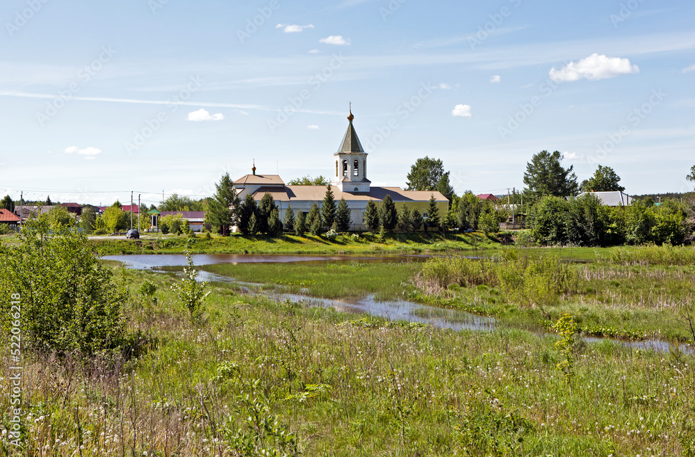 Church of St. Nicholas the Wonderworker on the bank of the pond. Nizhny Tagil. Sverdlovsk region. Russia