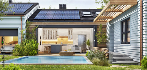 Modern patio with pool and open plan kitchen. House with solar panels on the roof and an electric car in the garage