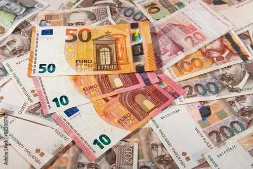 Euro banknotes and Kuna Croatian currency background photo