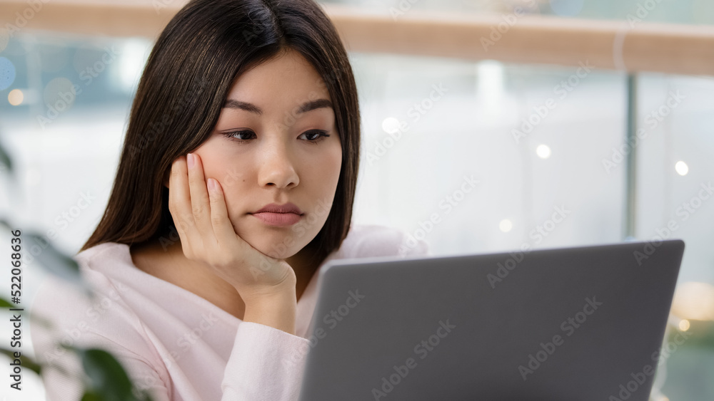 Portrait Korean businesswoman tired Asian girl student with laptop feeling sad about failure test exam online bored work job with computer upset female exhausted dissatisfied boring working routine Portrait Korean businesswoman tired Asian girl student with laptop feeling sad about failure test exam online bored work job with computer upset female exhausted dissatisfied boring working routine