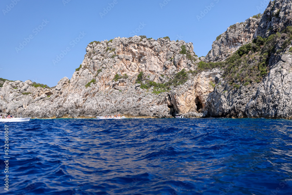 Rocky shorelines and caves along the coast of Corfu Greece

