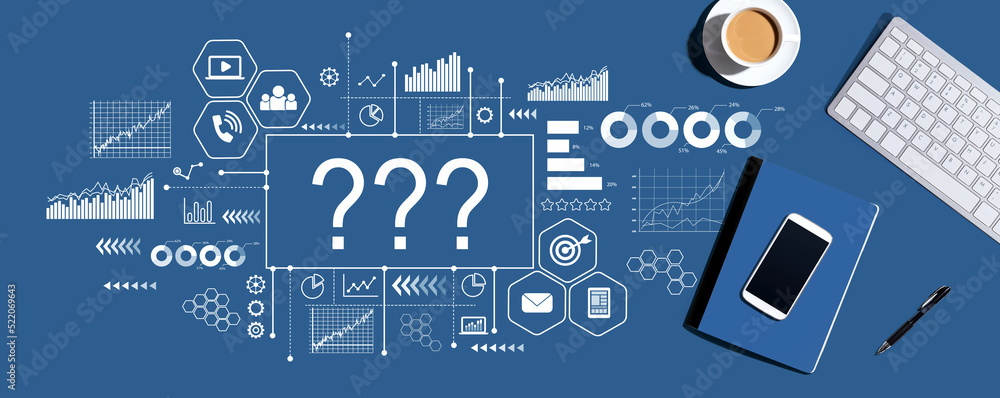 Question marks with a computer keyboard and office items Question marks with a computer keyboard and office items