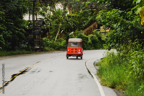 tuc tuc circulating on the highway of Costa Rica