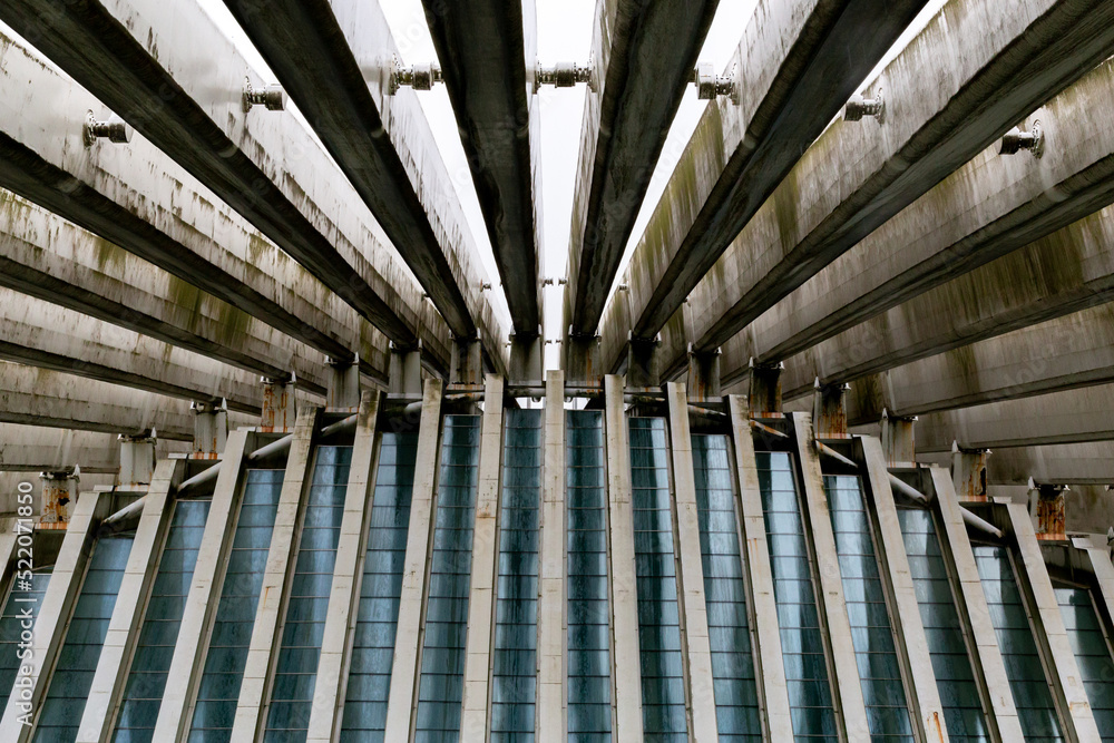 Fototapeta premium modernist construction in decline in the north of spain, decadent style building, white full of rust and deterioration