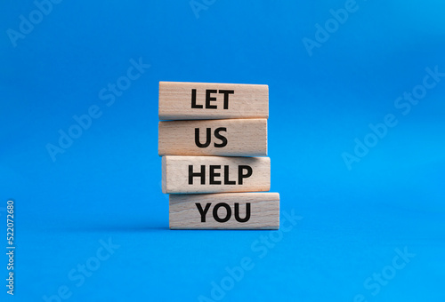 Let us help you symbol. Wooden blocks with words ILet us help you. Beautiful blue background. Business and Let us help you concept. Copy space.