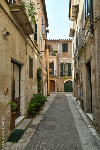 Fototapeta Naklejka Na Ścianę i Meble -  A narrow street in Sant'Agata de 'Goti, a medieval village in the province of Benevento in Campania, Italy.