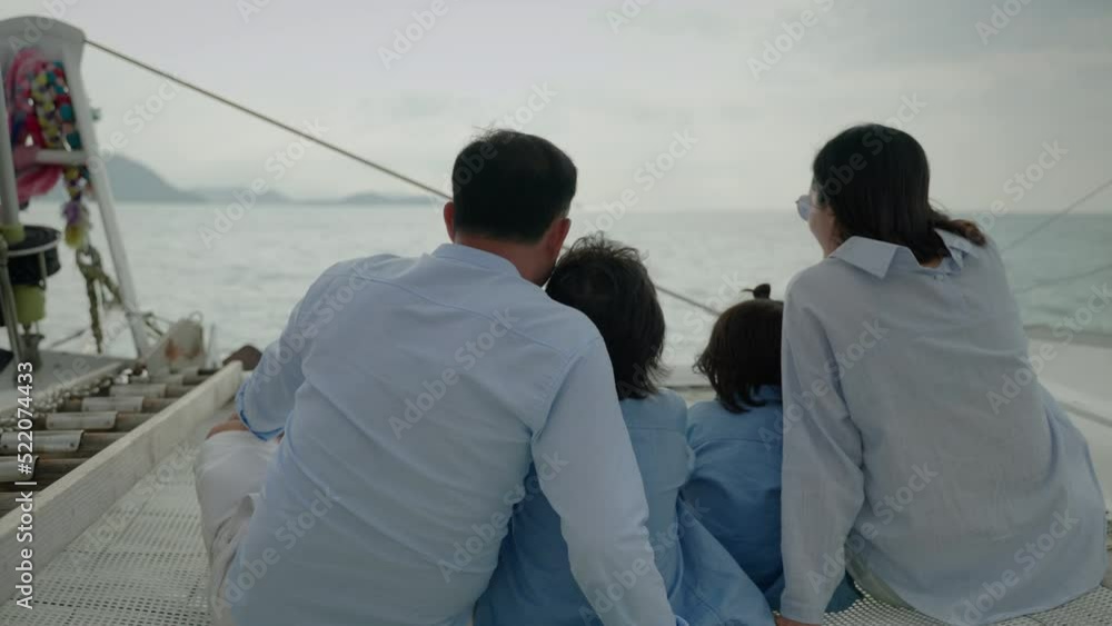 Asian family was relaxing on a yacht, we ate and jokingly enjoyed each other. Family relationship concept, relaxation
Asian family was relaxing on a yacht, we ate and jokingly enjoyed each other. Family relationship concept, relaxation