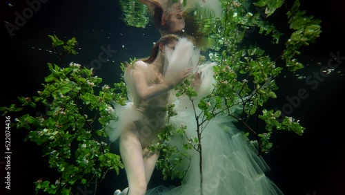 Wallpaper Mural graceful water nymph is floating in depth of magical sea or lake with fabulous garden Torontodigital.ca