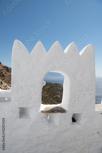 Detail shot of the breathtaking Panagia Hozoviotissa monastery on Amorgos island in Greece. photo