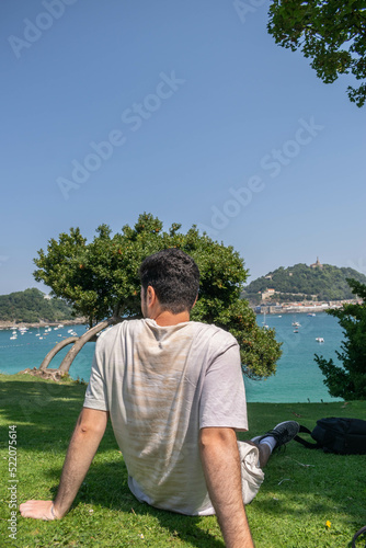 Boy enjoying the view of the sea