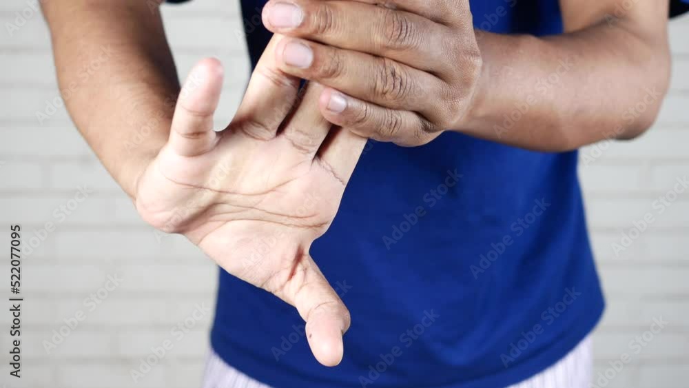 man suffering pain in fingers man suffering pain in fingers