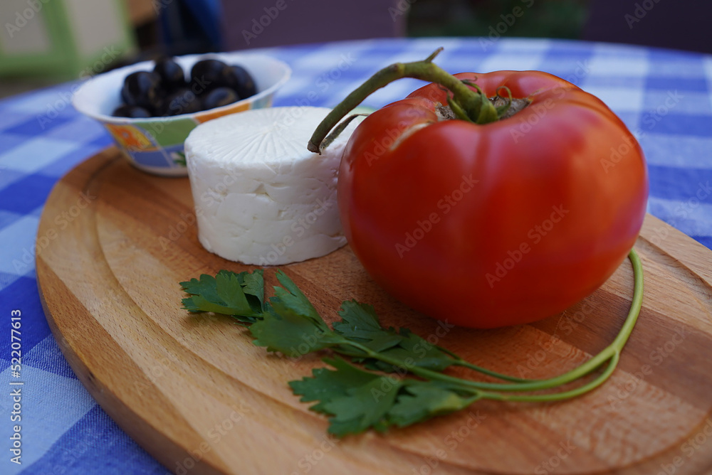 Board of fresh vegetables and Greek feta cheese Board of fresh vegetables and Greek feta cheese