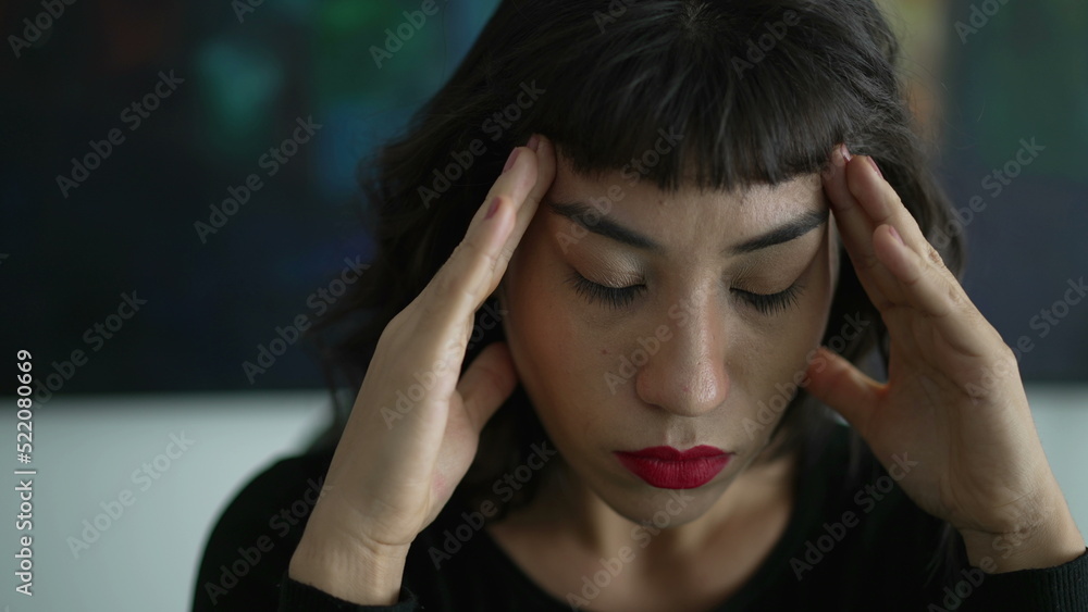 One anxious latina girl feeling apprehension. Concerned young restless woman. Person with worried emotion One anxious latina girl feeling apprehension. Concerned young restless woman. Person with worried emotion
