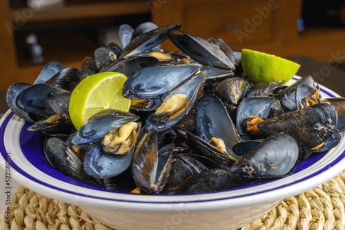 Mussels steamed in their juice with lemon. Mediterranean food, Spain