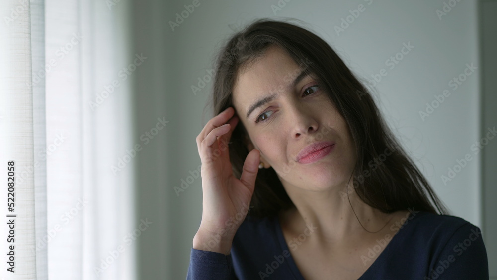 One confused woman thinking deeply about solution. Person in dilemma about choice One confused woman thinking deeply about solution. Person in dilemma about choice