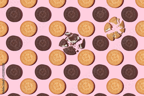 Pattern of cookies. Cookies on a pink background. Flat lay. Sweet cookies flat lay pattern on light pink background. Top view.