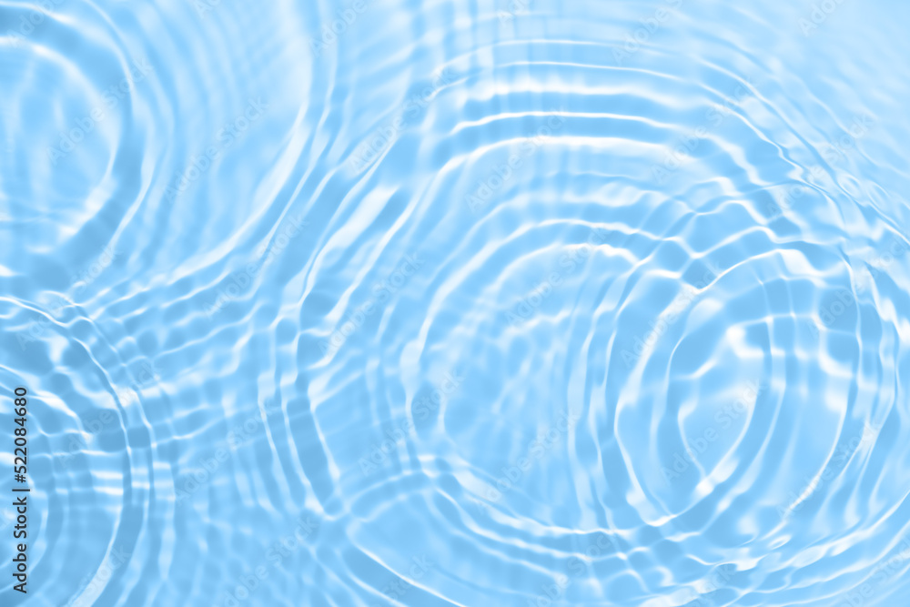 Fresh water background. Blue abstract pattern with clear rippled water texture. Top view Fresh water background. Blue abstract pattern with clear rippled water texture. Top view