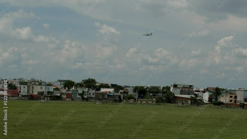Landing of an Airbus aircraft at Ho Chi Minh Airport, Against the backdrop of a beautiful sky and infrastructure at Ho Chi Minh Airport, Asia, Saigon, Vietnam, April 5, 2022