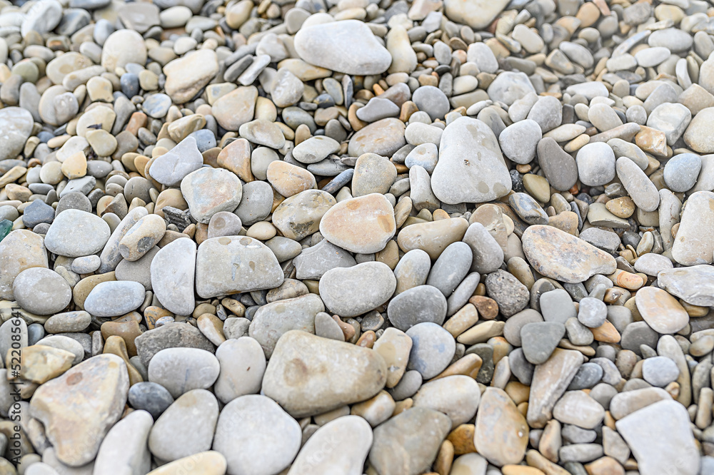 Stones on the sea. Texture of stones. Pebbles by the water. Rest on the sea. Stones on the sea. Texture of stones. Pebbles by the water. Rest on the sea.