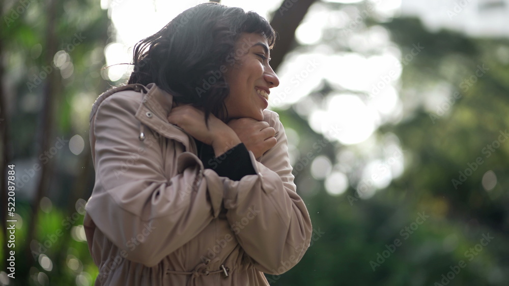 A joyful hispanic woman feeling happy. South American person celebrates achievement and success A joyful hispanic woman feeling happy. South American person celebrates achievement and success