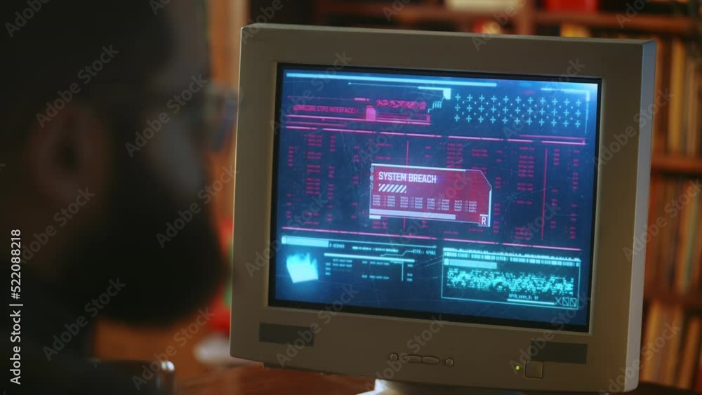 Man watching system breaching process on retro desktop pc, cyber crime in 1990s Man watching system breaching process on retro desktop pc, cyber crime in 1990s
