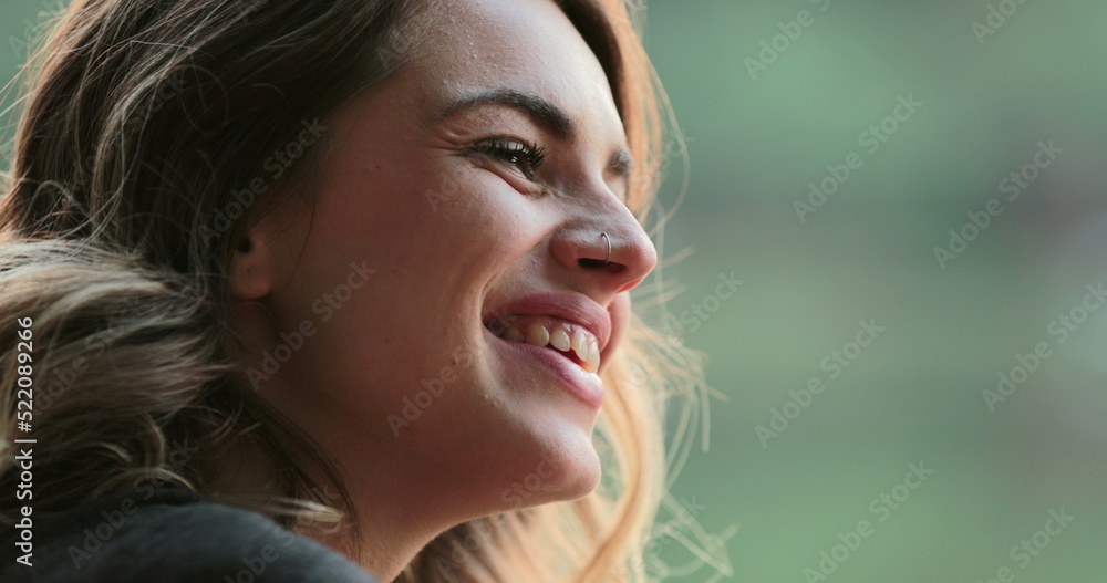 Young woman spontaneous real life laugh. Authentic candid girl acting bashful and flirtatious Young woman spontaneous real life laugh. Authentic candid girl acting bashful and flirtatious