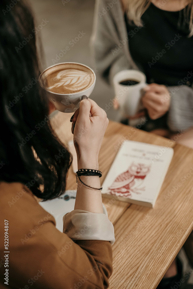 Obraz premium close up of a person holding a coffee