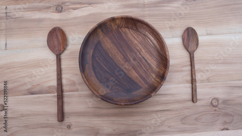 wooden kitchen utensils on wooden table