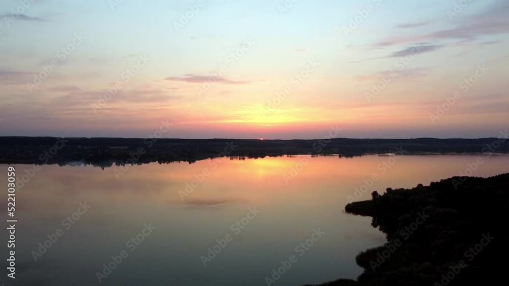 Haze over the lake against the backdrop of a beautiful sunset Haze over the lake against the backdrop of a beautiful sunset