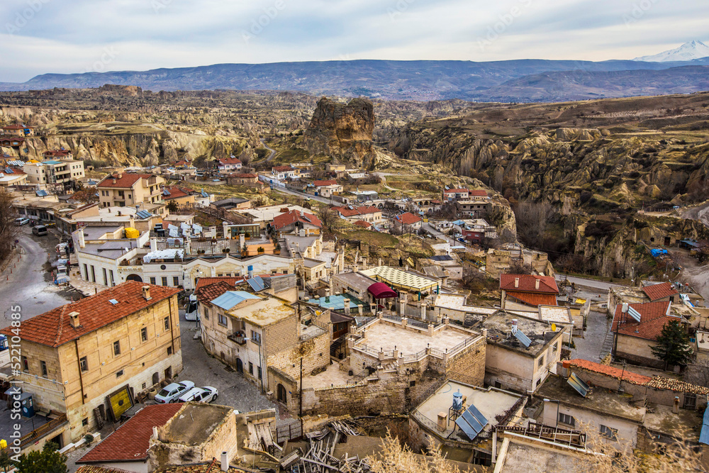 Aerial view of  Ortahisar town in Cappadocia, Turkey. Old town and mosque minaret, Anatolia, Turkey