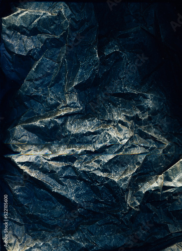 Rock texture. Grunge overlay. Crumpled foil photo editor layer. Rough creased wrinkled paper dust scratches noise on dark illustration abstract background.