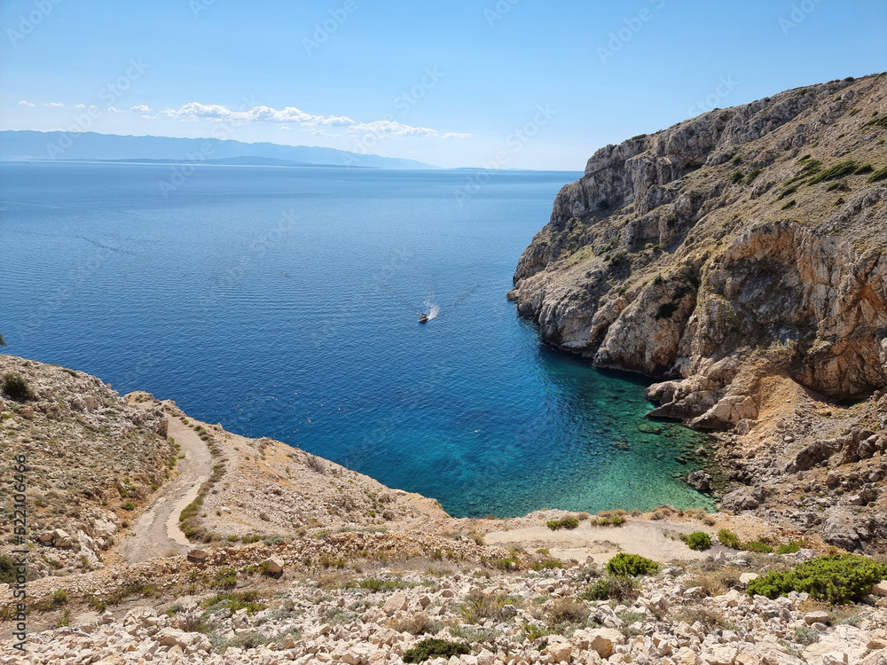 Mali Bok beach on island Cres, Croatia in summer. View of Kvarner bay with islands Krk, Rab.