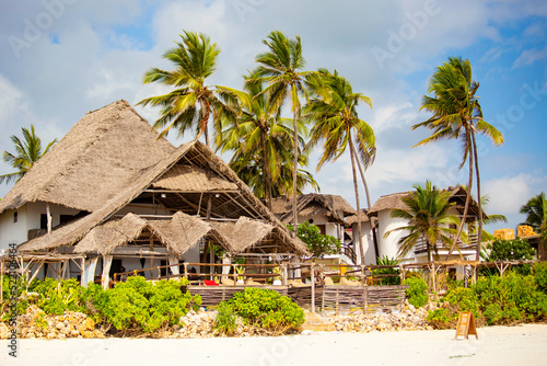 Beautiful Zanzibar beach hotel, traditional exotic beach huts at Matemwe beach, Zanzibar, Tanzania