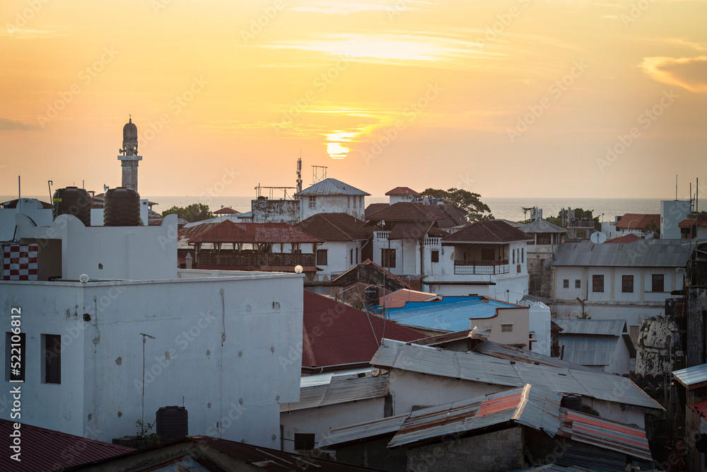 Beautiful sunset over Stone Town, Zanzibar. Aerial view of Stone Town, Tanzania Beautiful sunset over Stone Town, Zanzibar. Aerial view of Stone Town, Tanzania