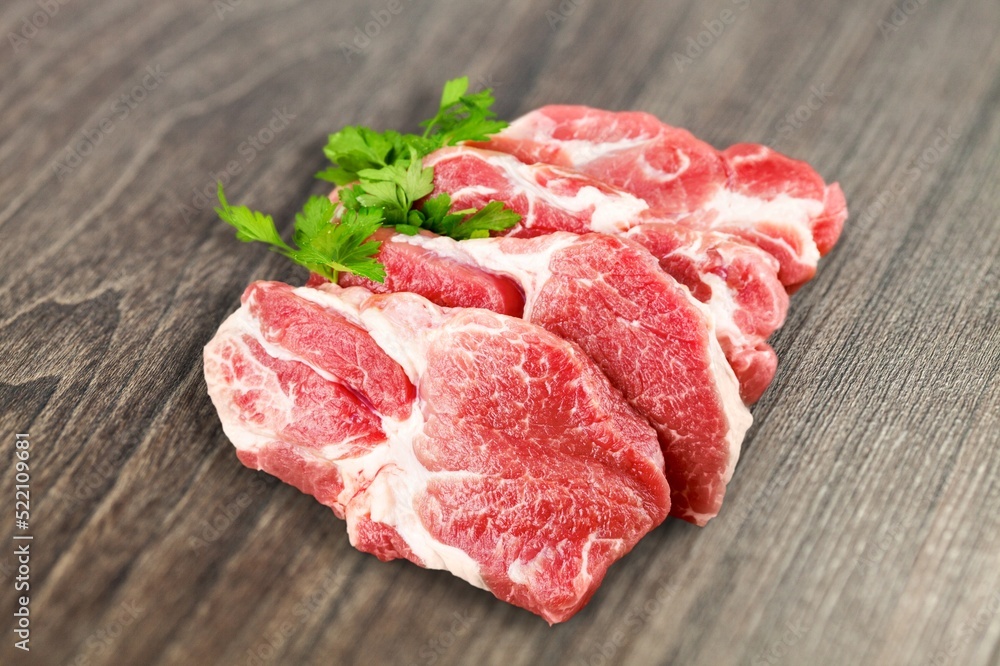 Seasoned raw beef meat steak on the desk