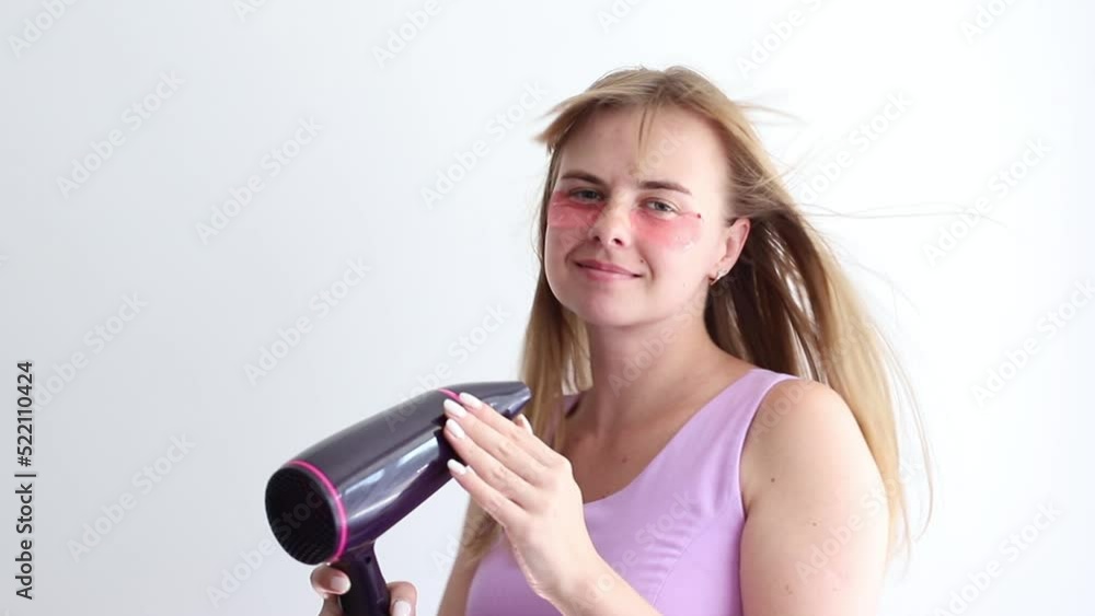 woman singing with hair dryer on white background woman singing with hair dryer on white background