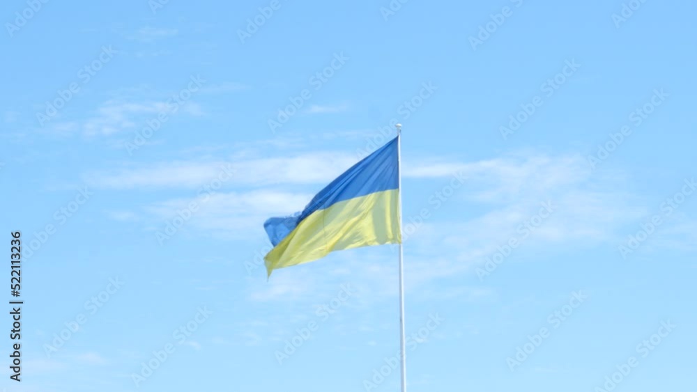 ukranian flag on blue sky ukranian flag on blue sky