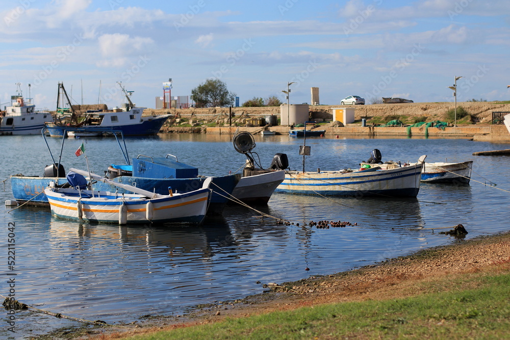 Fototapeta premium Boats in the harbour, view of the small Sicilian port, fishing, no people, Scoglitti / Sicily.